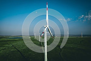 Wind Turbines Windmill Energy Farm with blue sky