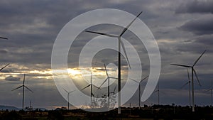 Wind Turbines Windmill Energy Farm. windmill wind turbines in field. Wind turbines power generator electric.