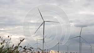 Wind Turbines Windmill Energy Farm. windmill wind turbines in field. Wind turbines power generator electric.