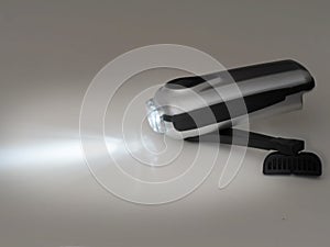 Wind up dynamo torch, flashlight, with light.