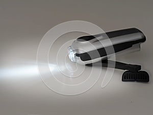 Wind up dynamo torch, flashlight, with light. photo