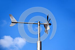 Wind vane. Anemometer wind speed indicator and measuring device. steel tube post