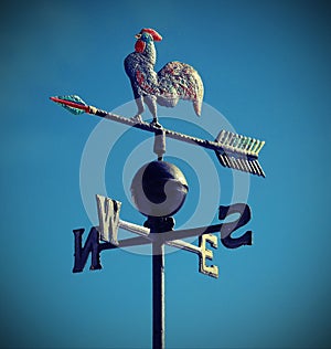 Wind weathervane that marks the way forward with the arrows