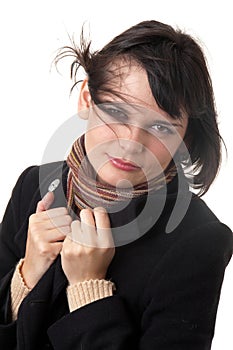 Wind. young woman in topcoat