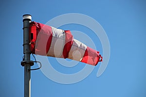 Windbag on bridge in the botlek area in the port of Rotterdam, t