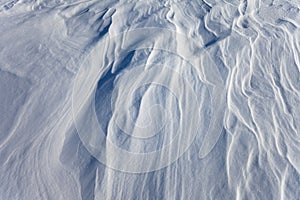 Windblown snow surface, background pattern