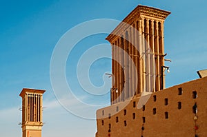 Windcatcher towers is a traditional Persian architectural element to create natural ventilation in buildings, old city Yazd Iran