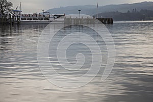 Windermere lake, England - a dark, moody day in autumn.