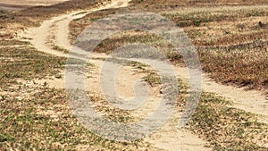 Winding dirt road in countryside