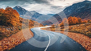 A winding empty road going into the mountains