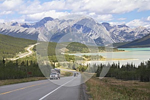 Winding Highway Next to a Mountain Lake - Alberta, Canada