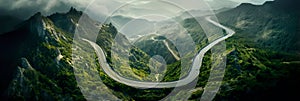 winding mountain road as it snakes through rugged terrain, offering a bird& x27;s-eye view of the challenging twists and