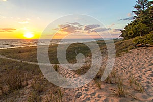 Winding Path To A Sunset Beach Horizon