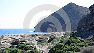 Winding pathway leading to the picturesque Playa de los Muertos beach. Spain