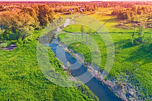 Winding river and irrigation ditches in spring