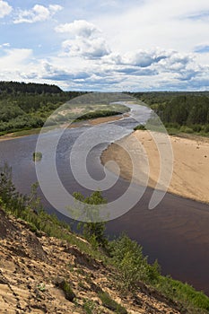 Winding River Vaga. View from steep bank near the village Undercity