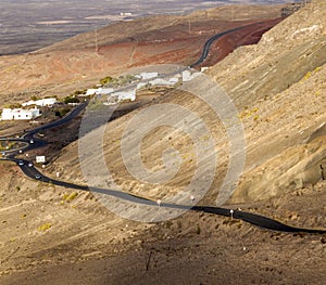 Winding road along an old volcano to Femes photo