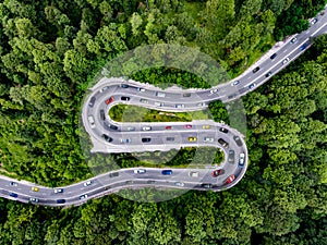 Winding road full of traffic, rush hour traffic on a highway