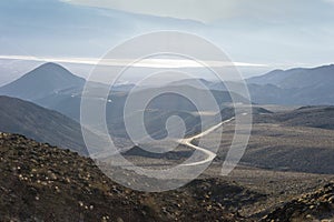 Winding road among mountains