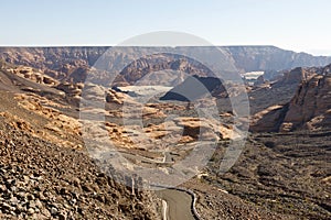Winding road near Al Ula, which leads up through a dry valley to a viewpoint, Saudi Arabia