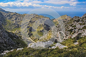 Winding road through Serra de Tramuntana, view from Nus de Sa Corbata viewpoint in Mallorca, Spain photo