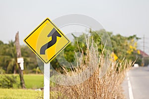 Winding road sign
