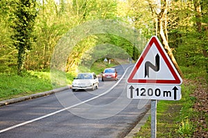 Winding road sign