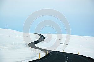 Winding road, snow, blue sky, Dettifoss, Iceland