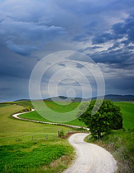 Winding road to a destination in Tuscany