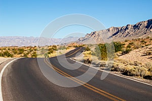 Winding road Valley of Fire Highway in Nevada desert