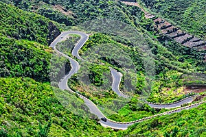 Winding or serpantine road in valley photo