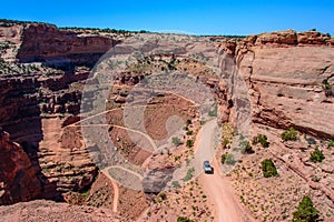 Winding Shafer Trail road in Canyonlands national park, Moab Utah USA photo