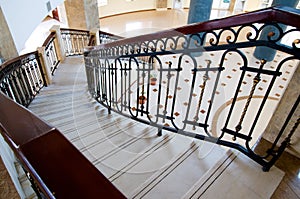 Winding staircase with forged rail