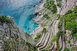 Winding stairs leading down to sea on a steep slope