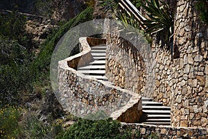 Winding stone staircase in the mountains