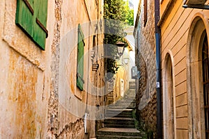 Winding street of the authentic, old town of Herceg Novi, Montenegro. We see old houses and very narrow