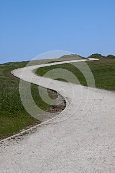 Winding trail over a hill