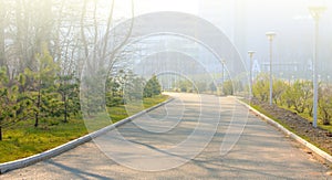 Winding walking path through the Park on Far Eastern Federal University on sunlight