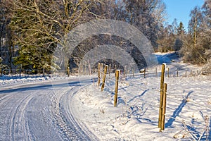 Winding winter road a sunny day