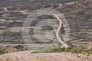 Winding Wyoming dirt road at McCullough Peaks Wild Horse Management Area