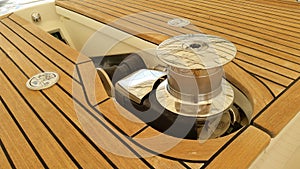 Windlass left side view with teak deck background