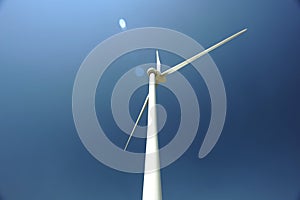 Windmill against blue sky