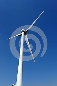 Windmill against blue sky