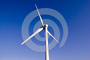 Windmill against blue sky