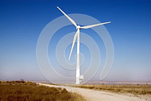 Windmill against blue sky