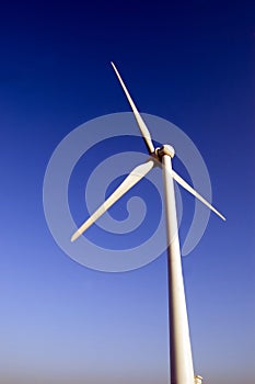 Windmill against blue sky