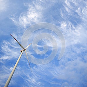 Windmill against blue sky with copy space