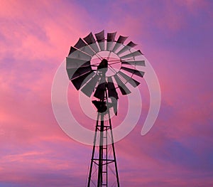 Windmill against dramatic sky
