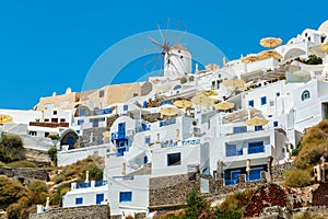 Windmill and apartments in Oia, Santorini, Greece