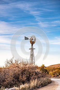 Windmill Around Corner from Dirt Road